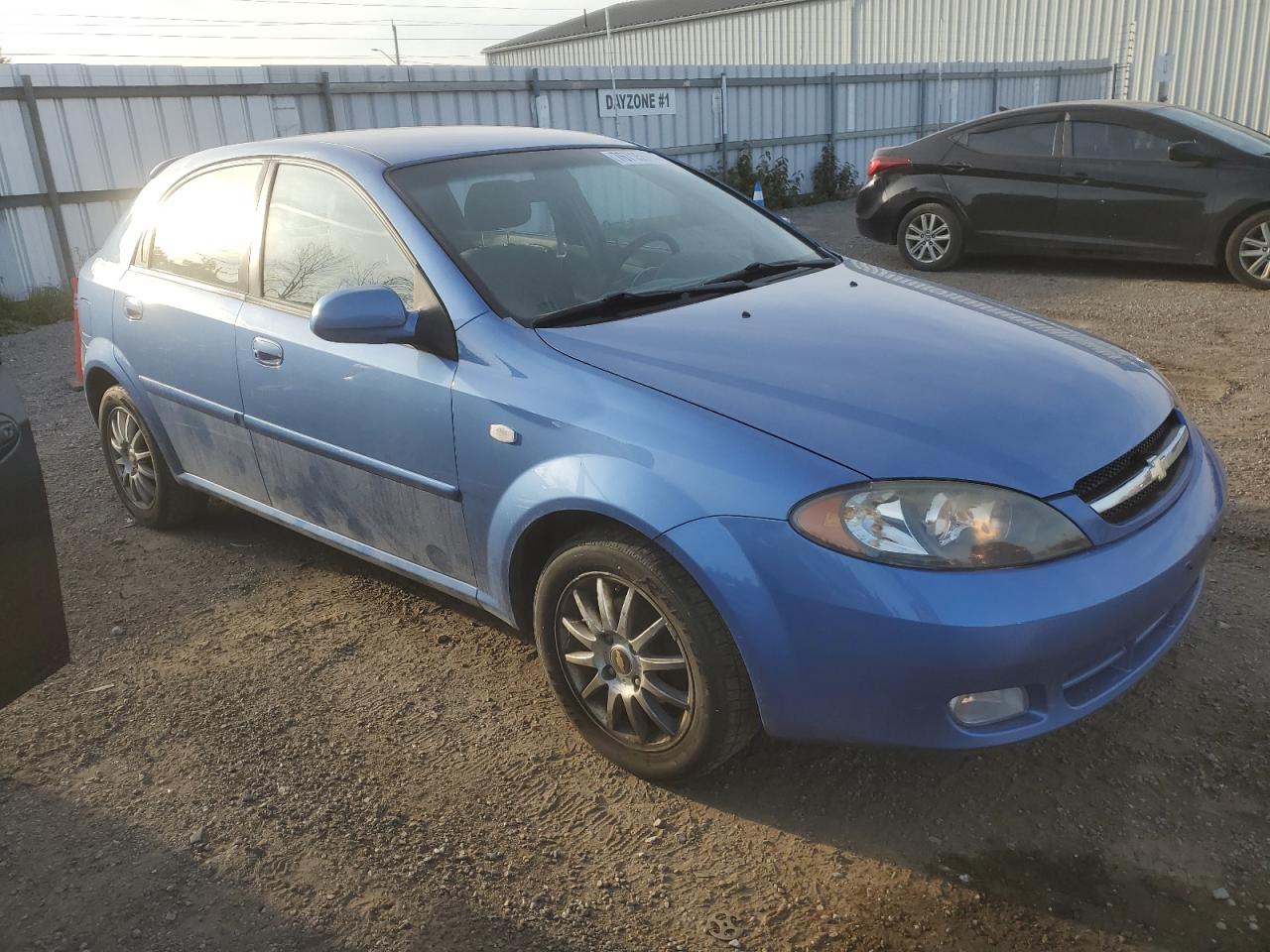 2005 Chevrolet Optra 5 Ls VIN: KL1JK69Z55K217355 Lot: 76715574