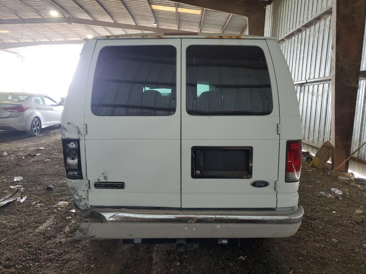 2004 Ford Econoline E350 Super Duty Wagon VIN: 1FBNE31L14HA00554 Lot: 76747024