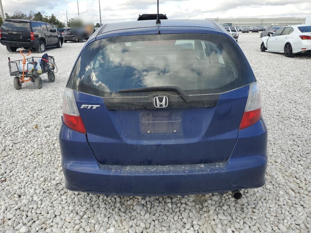 2011 Honda Fit VIN: JHMGE8H37BC021392 Lot: 77787564