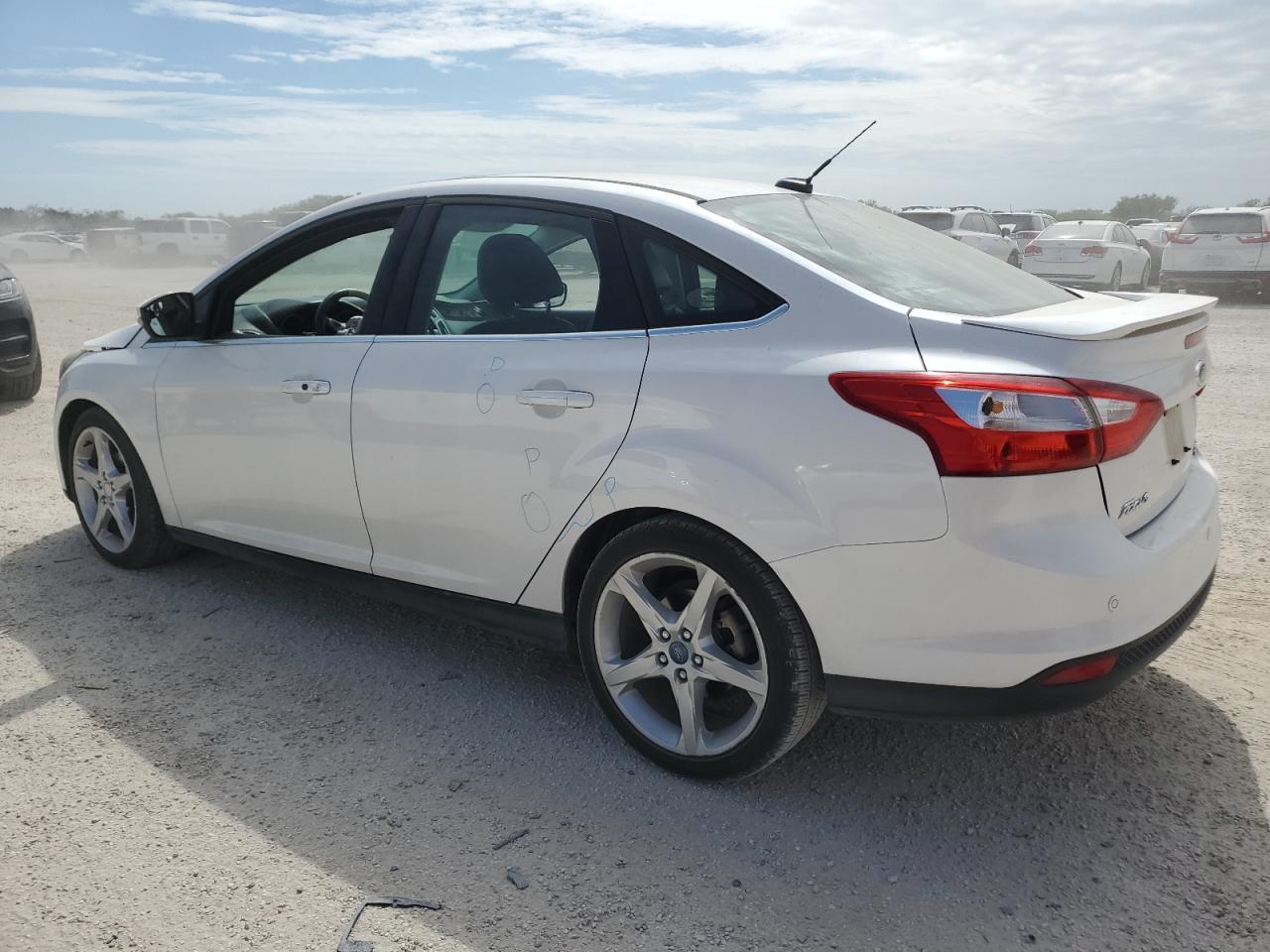 2013 Ford Focus Titanium VIN: 1FADP3J21DL144455 Lot: 73569264