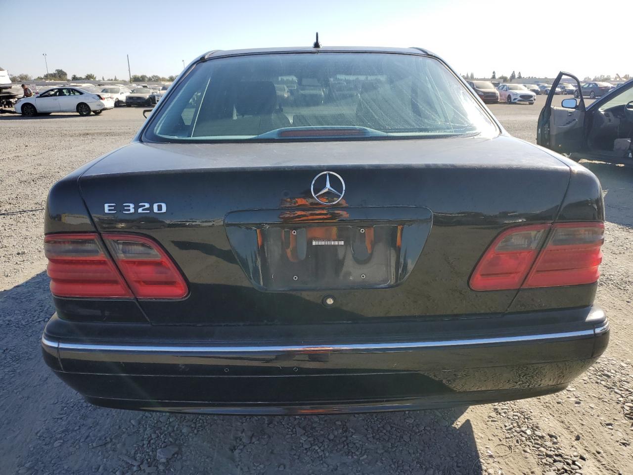 2000 Mercedes-Benz E 320 VIN: WDBJF65J4YB097144 Lot: 76689354