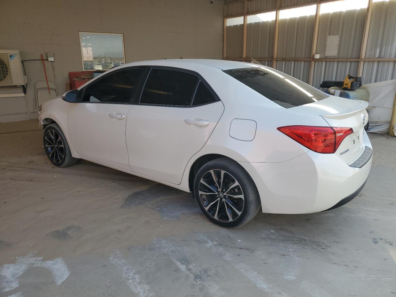 2018 Toyota Corolla L VIN: 5YFBURHE9JP856101 Lot: 78274474