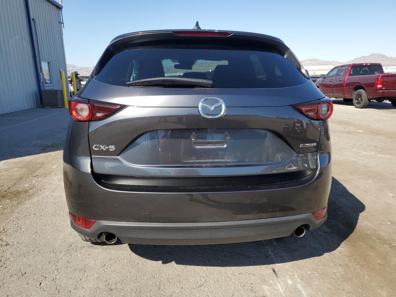 2021 Mazda Cx-5 Touring VIN: JM3KFACM5M1307652 Lot: 74297604