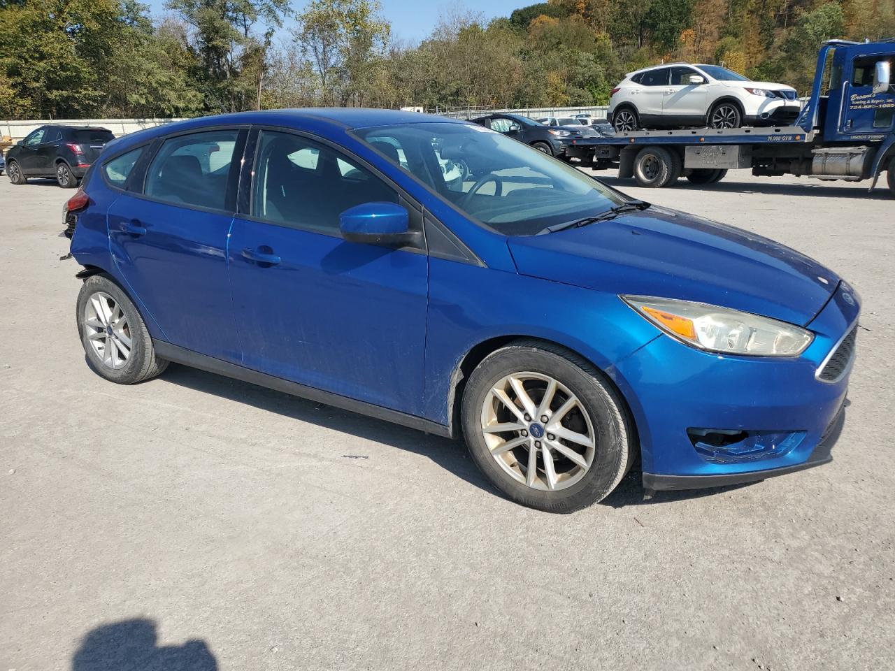 VIN 1FADP3K25JL315556 2018 FORD FOCUS no.4