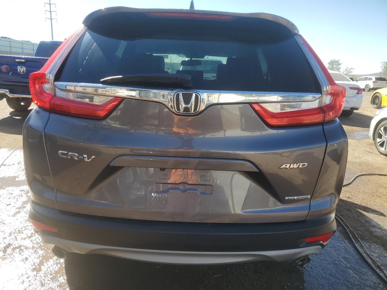 2018 Honda Cr-V Touring VIN: 7FARW2H98JE042086 Lot: 77377654