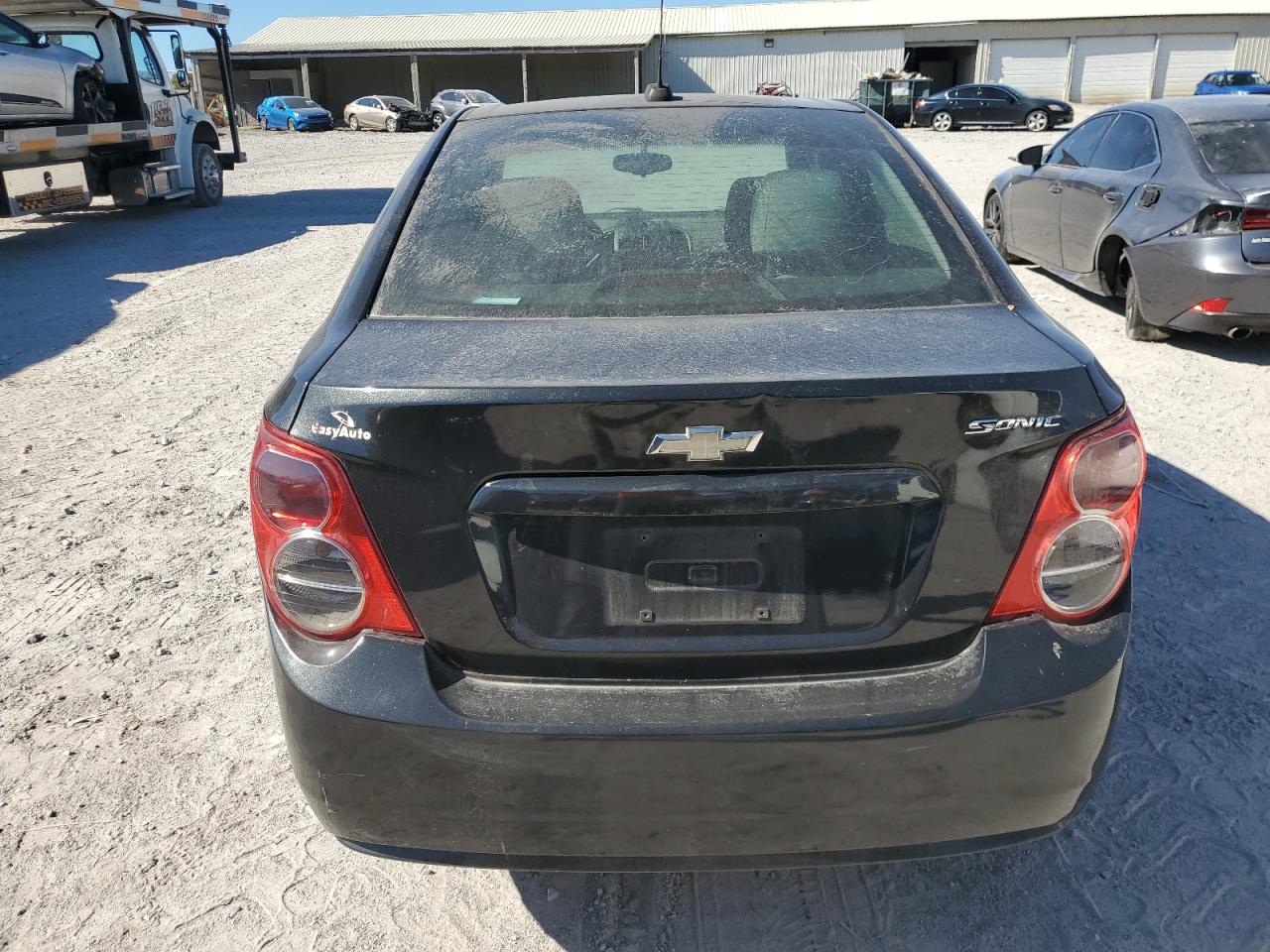 2015 Chevrolet Sonic Ls VIN: 1G1JA5SH1F4114830 Lot: 76322554