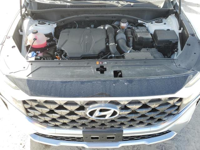 5NMS54AL1PH528814 Hyundai Santa Fe C 12