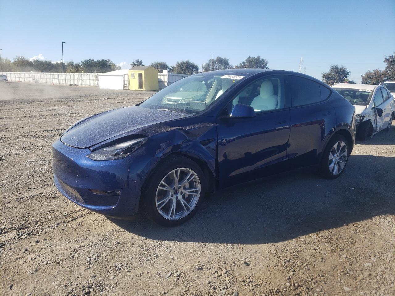 2023 Tesla Model Y VIN: 7SAYGDEE6PF672119 Lot: 75914074