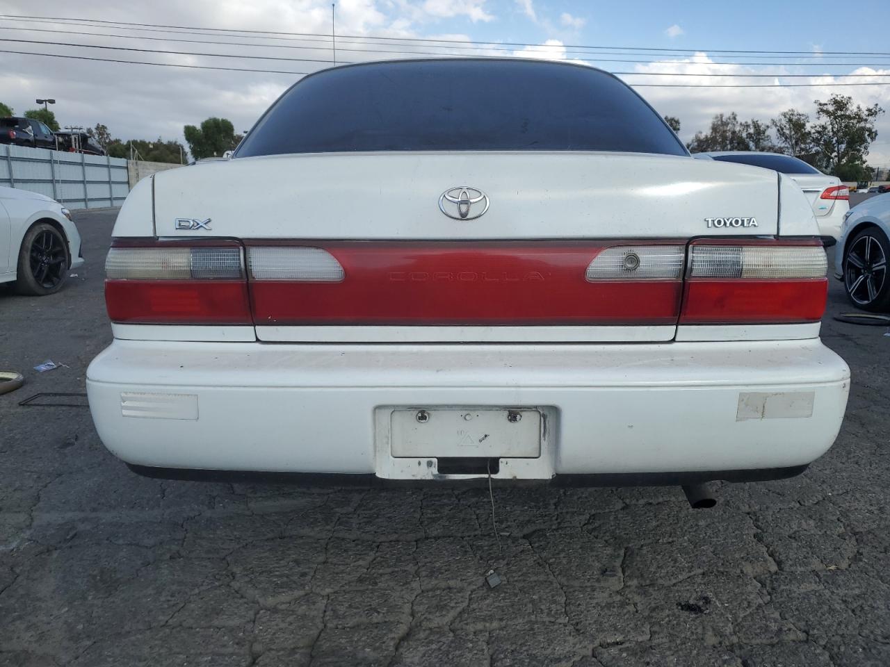 1996 Toyota Corolla Dx VIN: 1NXBB02E9TZ470130 Lot: 77891374