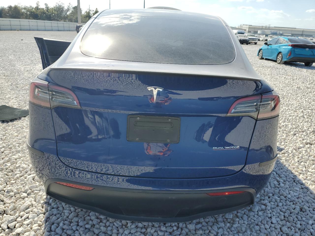 2022 Tesla Model Y VIN: 7SAYGDEF5NF452394 Lot: 77047634