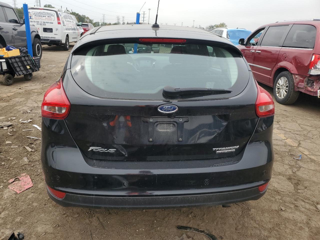 2016 Ford Focus Titanium VIN: 1FADP3N25GL383005 Lot: 73963354