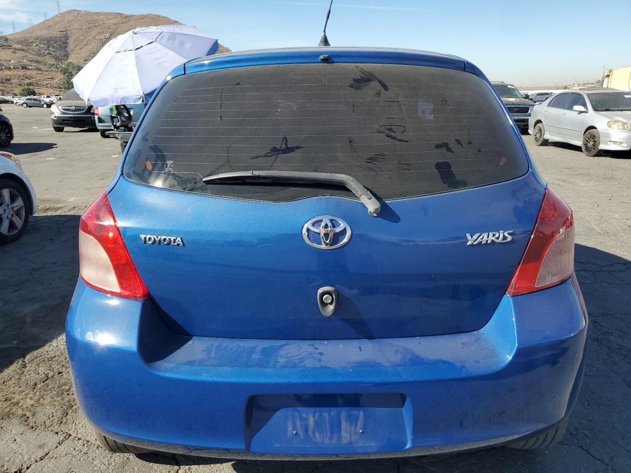 2007 Toyota Yaris VIN: JTDJT923975055504 Lot: 77754604