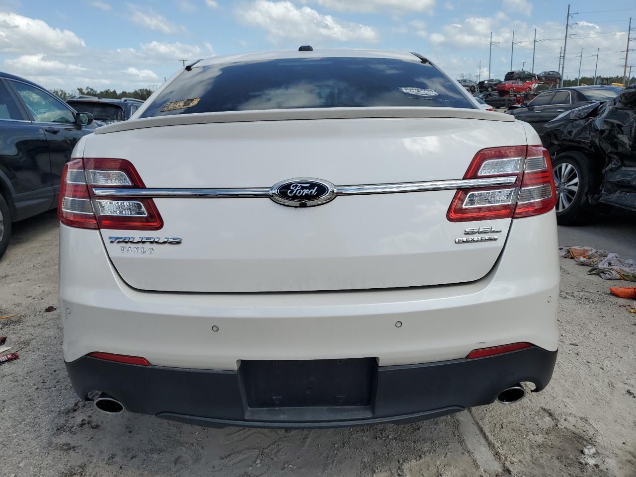 2014 Ford Taurus Sel VIN: 1FAHP2E85EG174613 Lot: 76810134