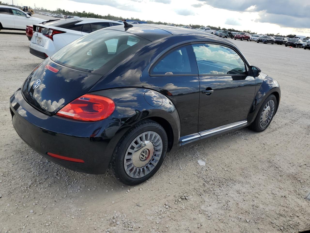 2014 Volkswagen Beetle VIN: 3VWJ17AT2EM637489 Lot: 74013144