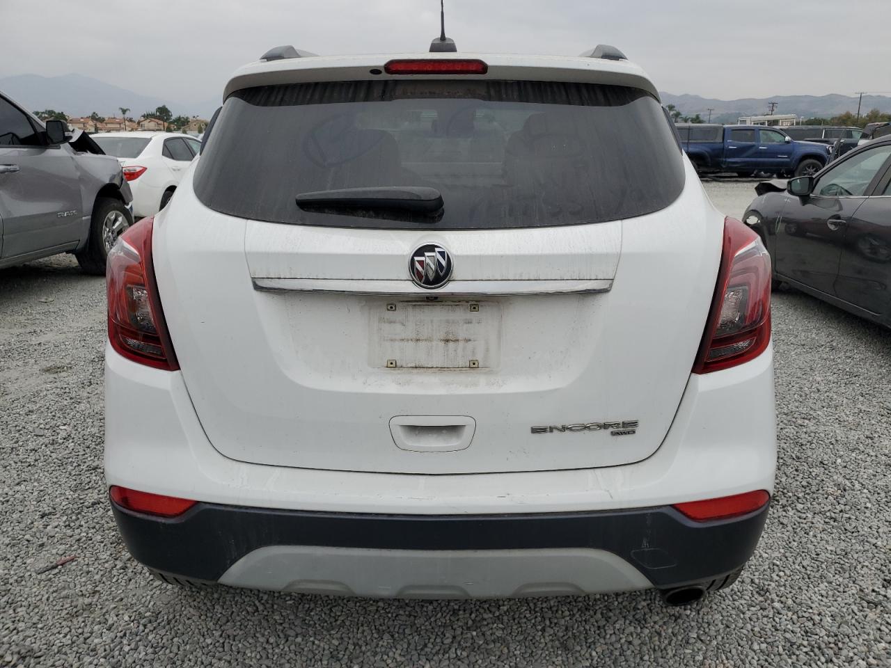 2019 Buick Encore Essence VIN: KL4CJGSMXKB796096 Lot: 76386214