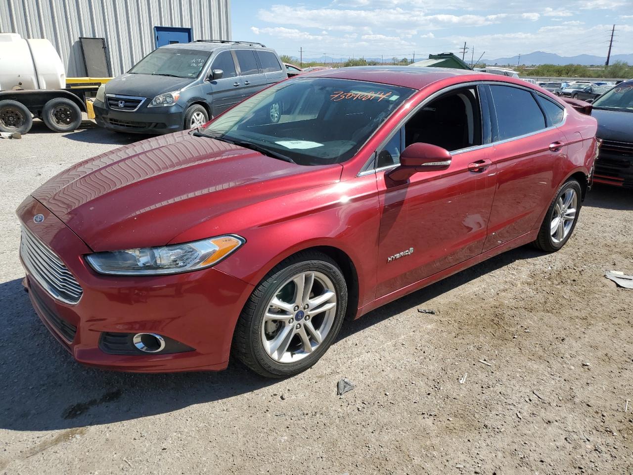 2015 Ford Fusion Se Hybrid VIN: 3FA6P0LUXFR253510 Lot: 75090814