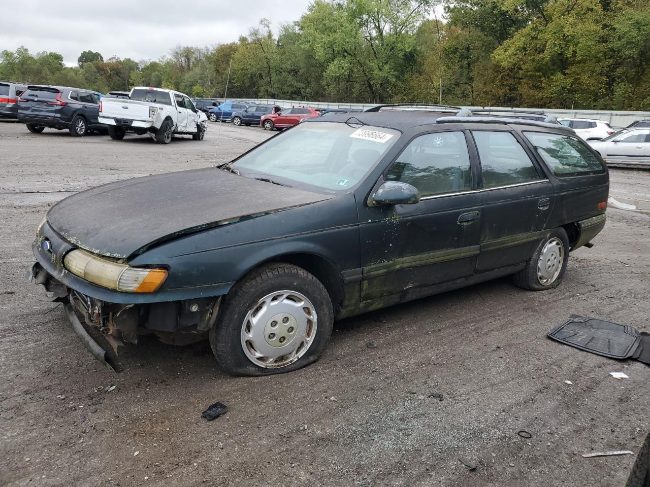 1995 Ford Taurus Gl VIN: 1FALP57U7SA210516 Lot: 73996664