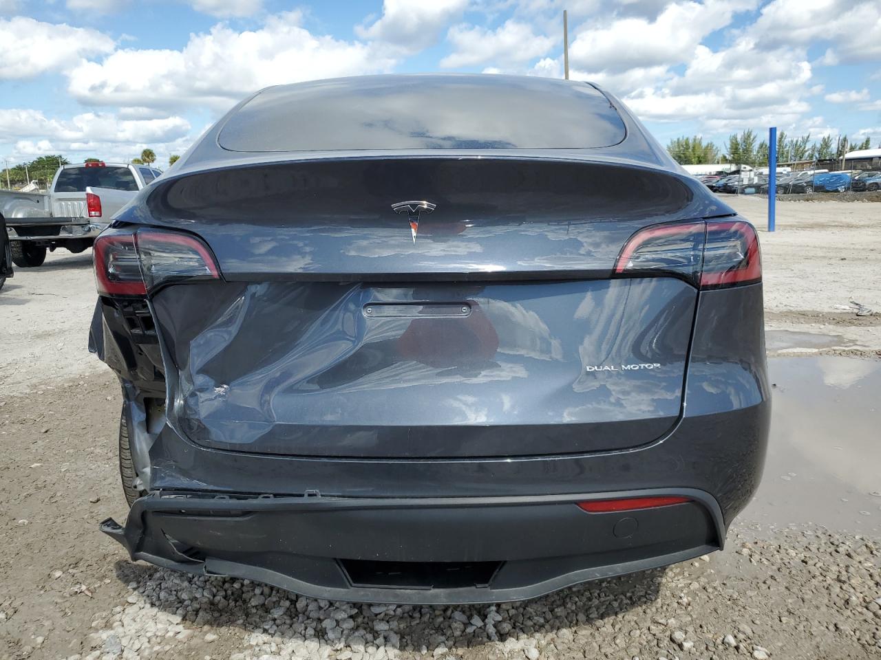 2023 Tesla Model Y VIN: 7SAYGDEE3PF865697 Lot: 77405034