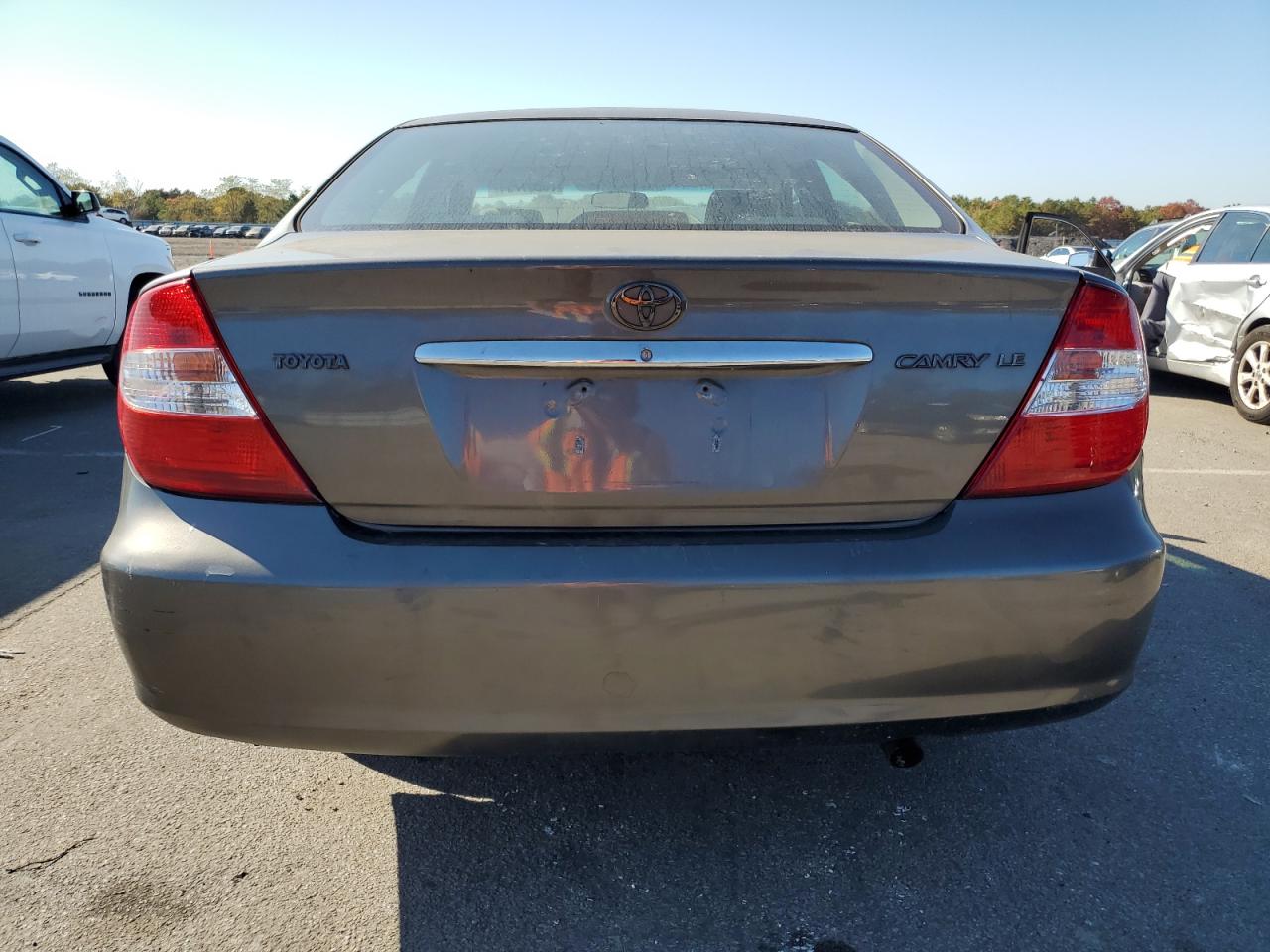 2003 Toyota Camry Le VIN: 4T1BE30K13U738749 Lot: 76231784