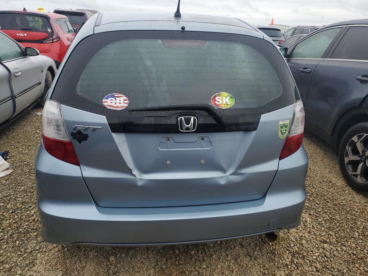 2011 Honda Fit VIN: JHMGE8H38BC013379 Lot: 73808534