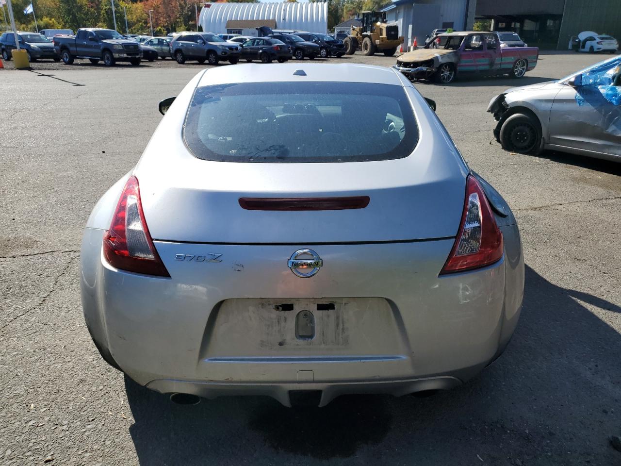 2009 Nissan 370Z VIN: JN1AZ44E69M407031 Lot: 75331544