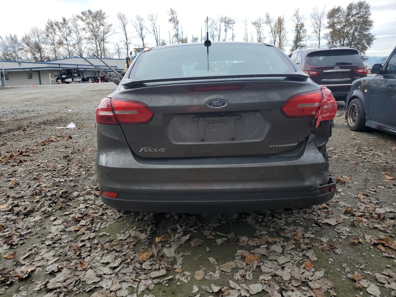 2015 Ford Focus Titanium VIN: 1FADP3J23FL249131 Lot: 76039744