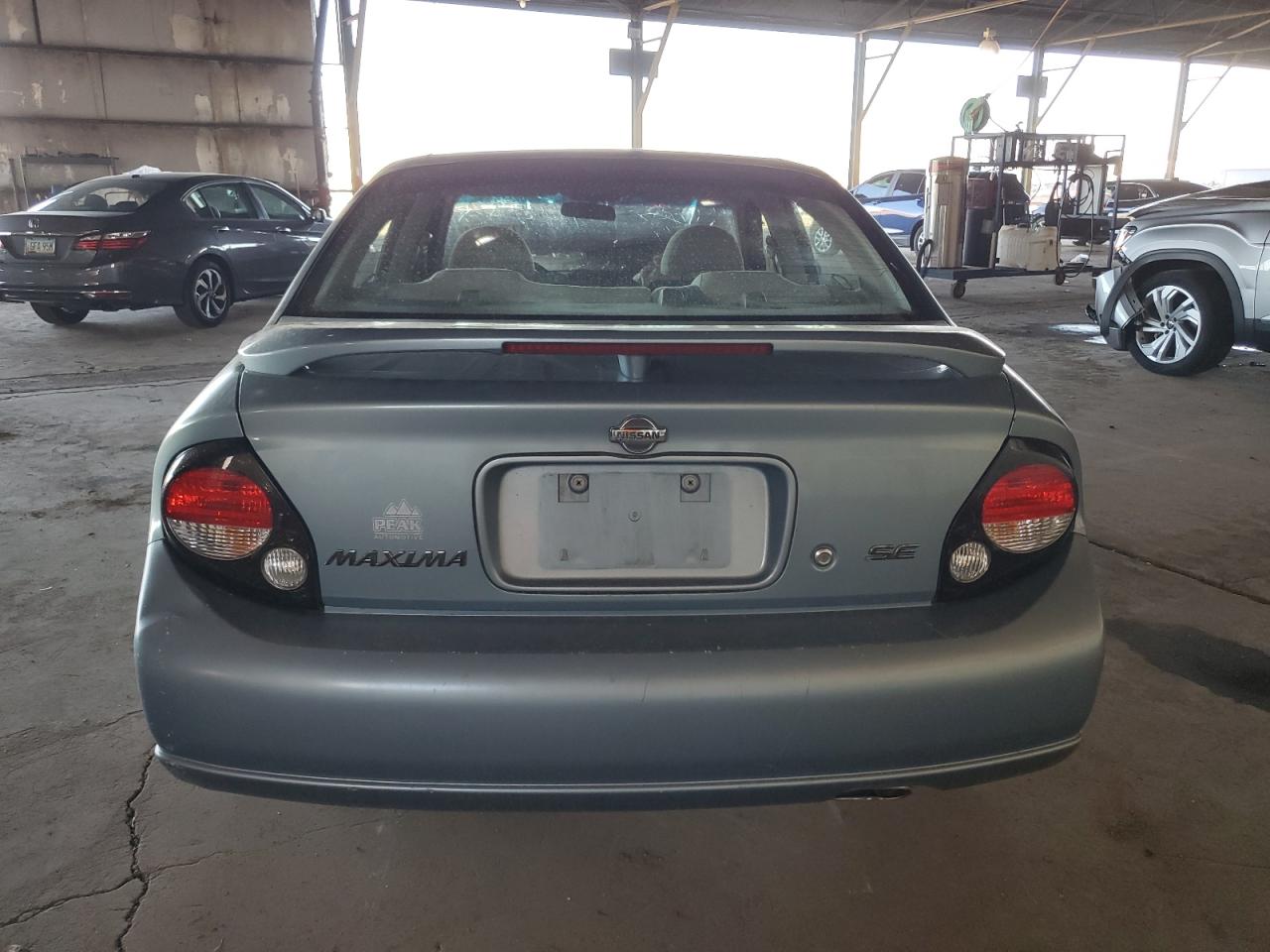 2001 Nissan Maxima Gxe VIN: JN1CA31D91T631281 Lot: 77225864