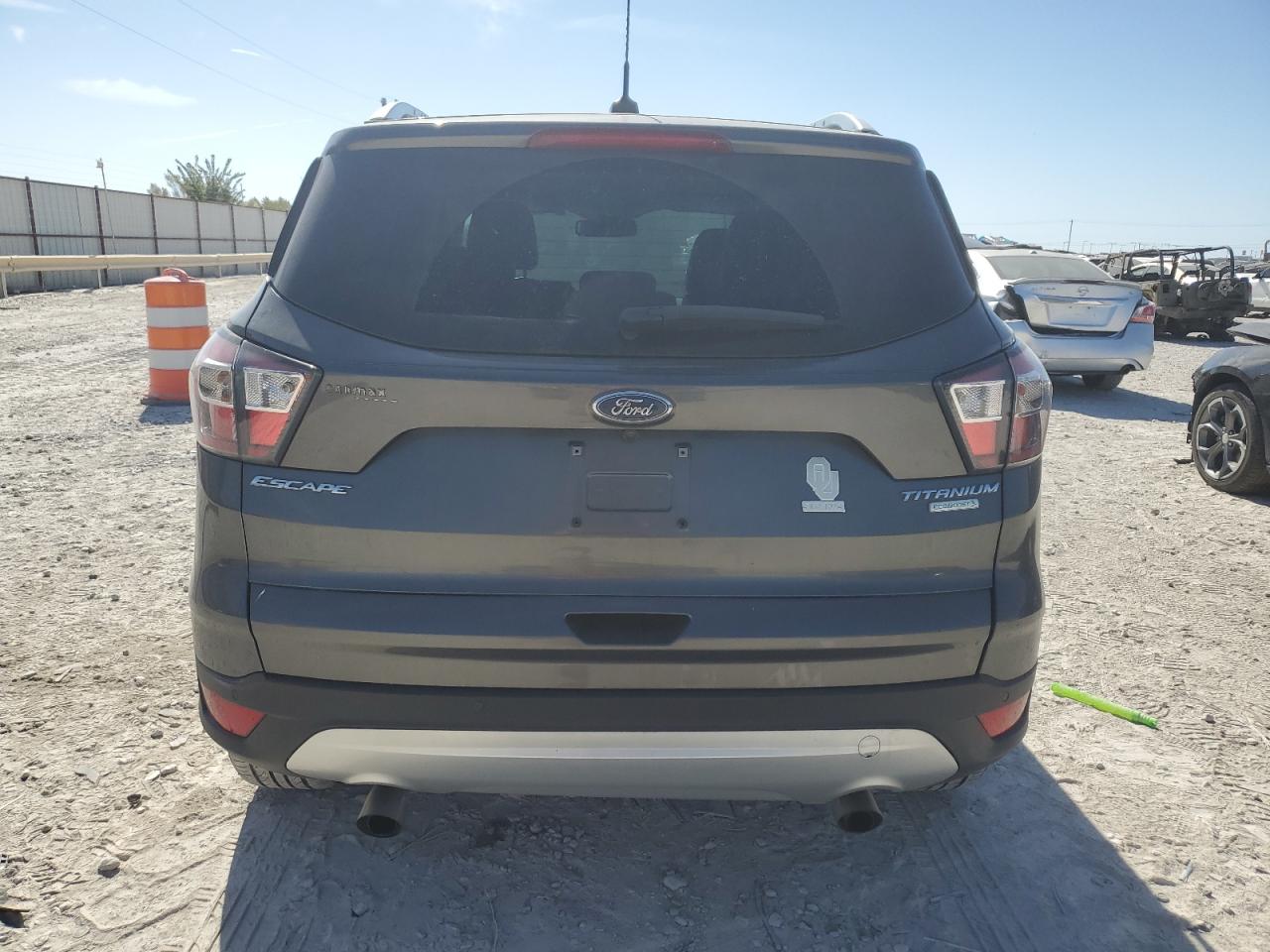 2017 Ford Escape Titanium VIN: 1FMCU0JD7HUA32057 Lot: 77811204