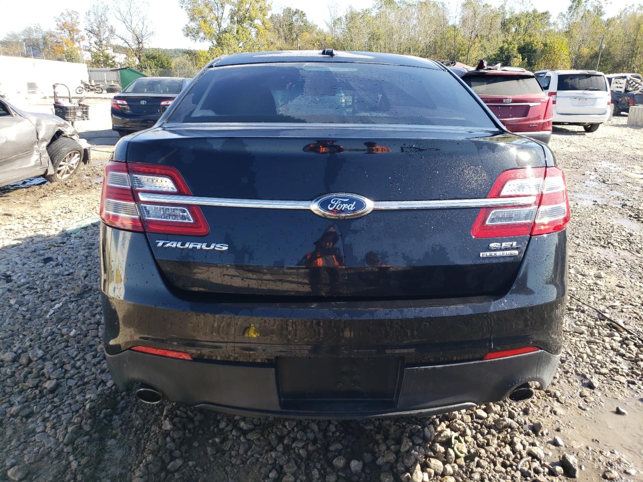 2014 Ford Taurus Sel VIN: 1FAHP2E88EG104216 Lot: 74998674