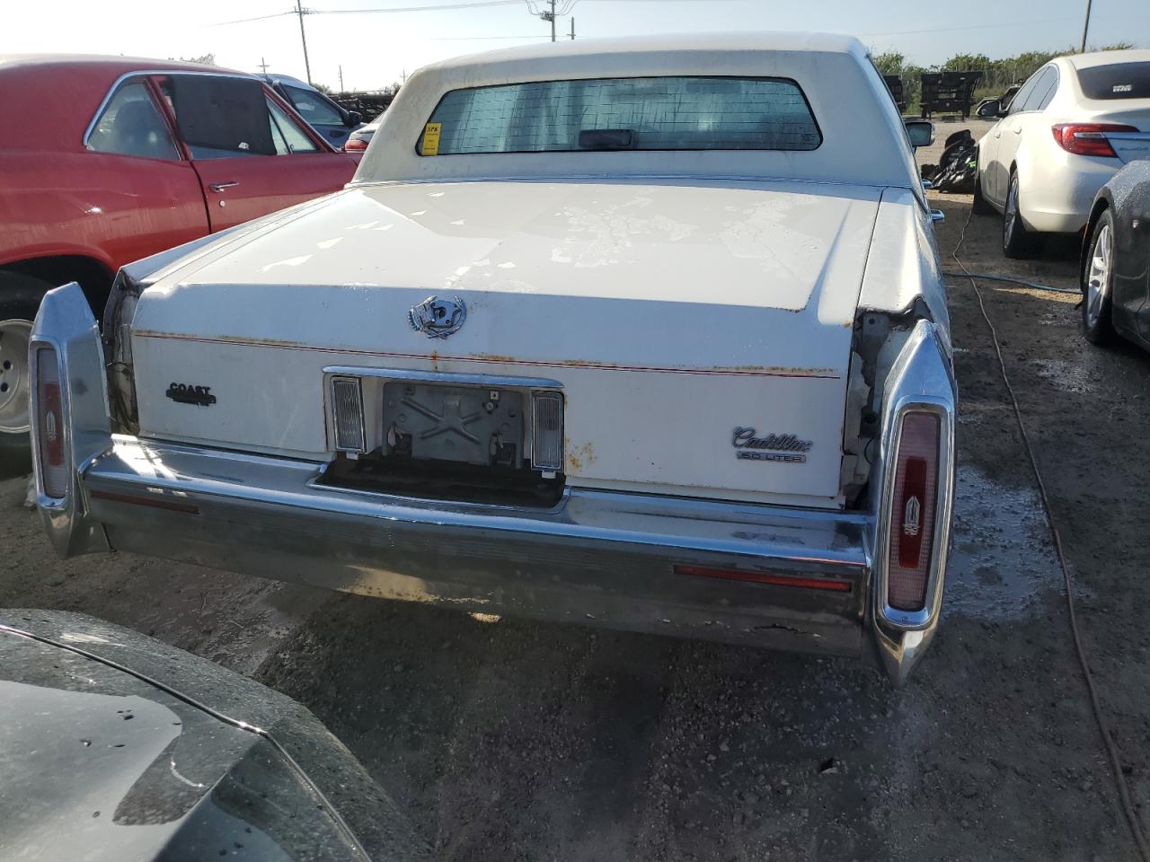 1990 Cadillac Brougham VIN: 1G6DW54Y6LR711203 Lot: 76484634