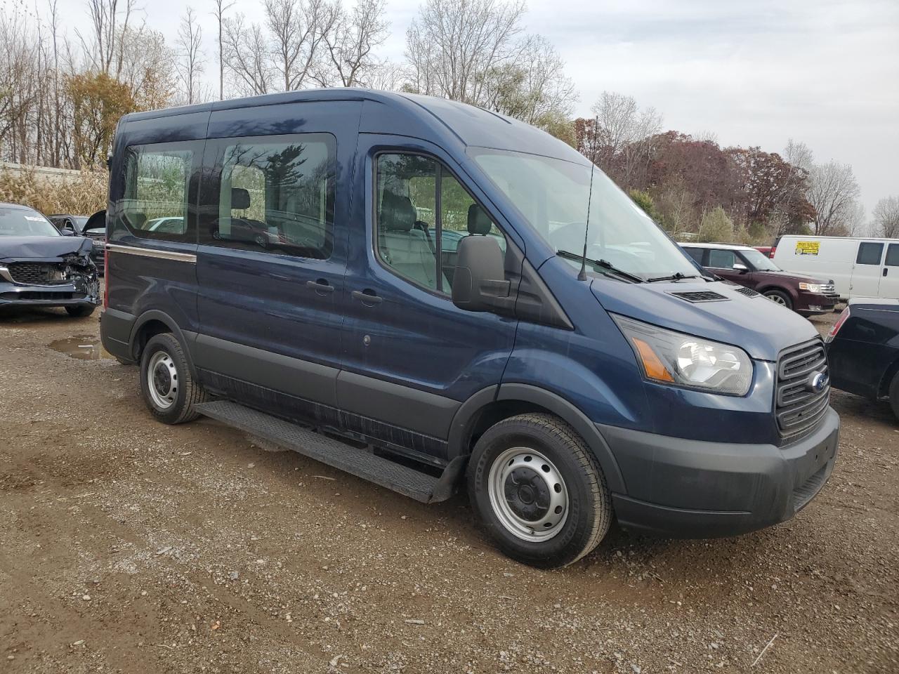 2015 Ford Transit T-150 VIN: 1FMZK1CM2FKB31879 Lot: 77944234