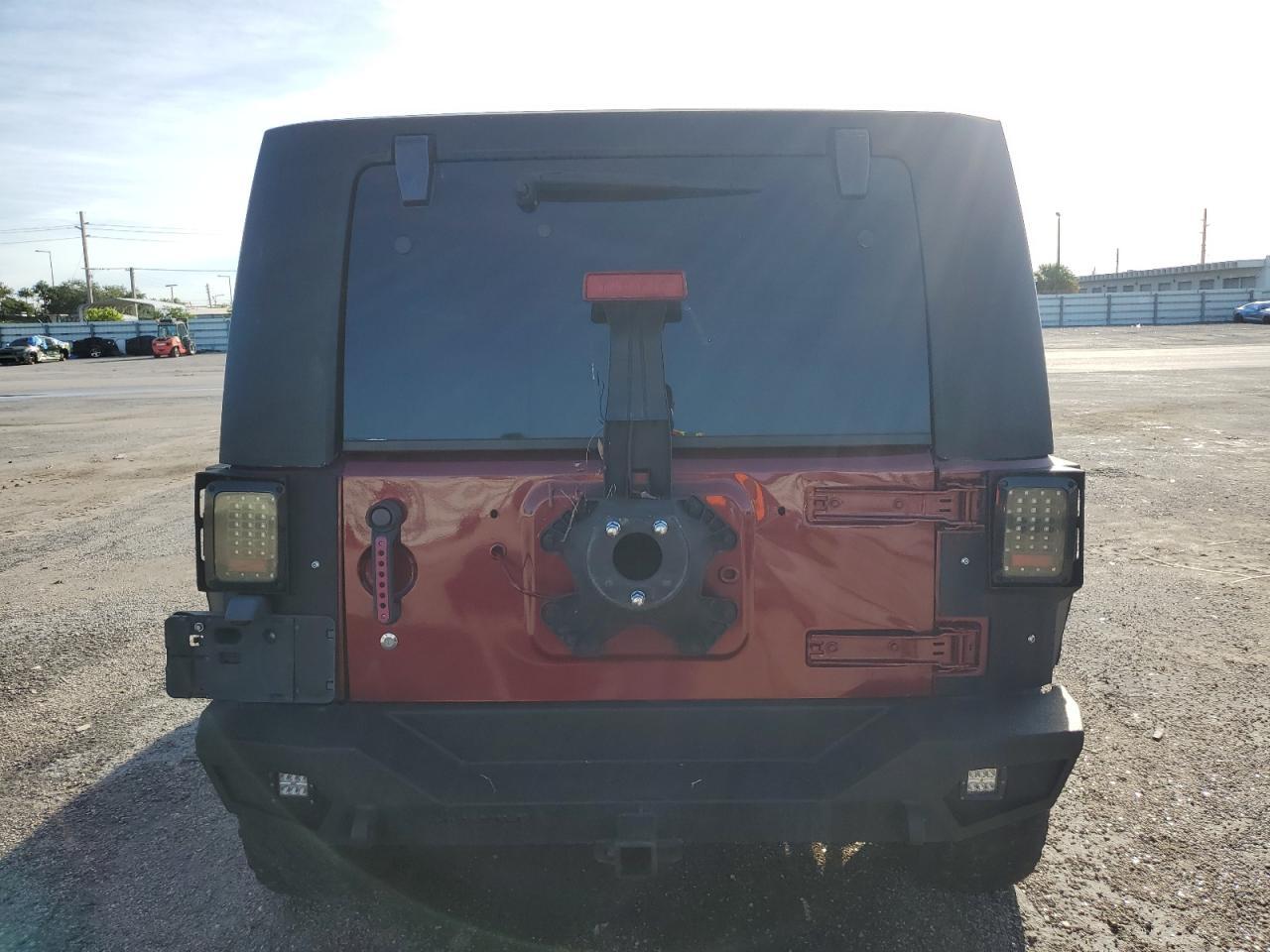 2009 Jeep Wrangler Unlimited X VIN: 1J4GA39189L703036 Lot: 75697774