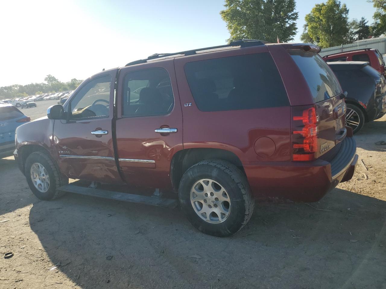 2010 Chevrolet Tahoe K1500 Ltz VIN: 1GNUKCE07AR111655 Lot: 73950414