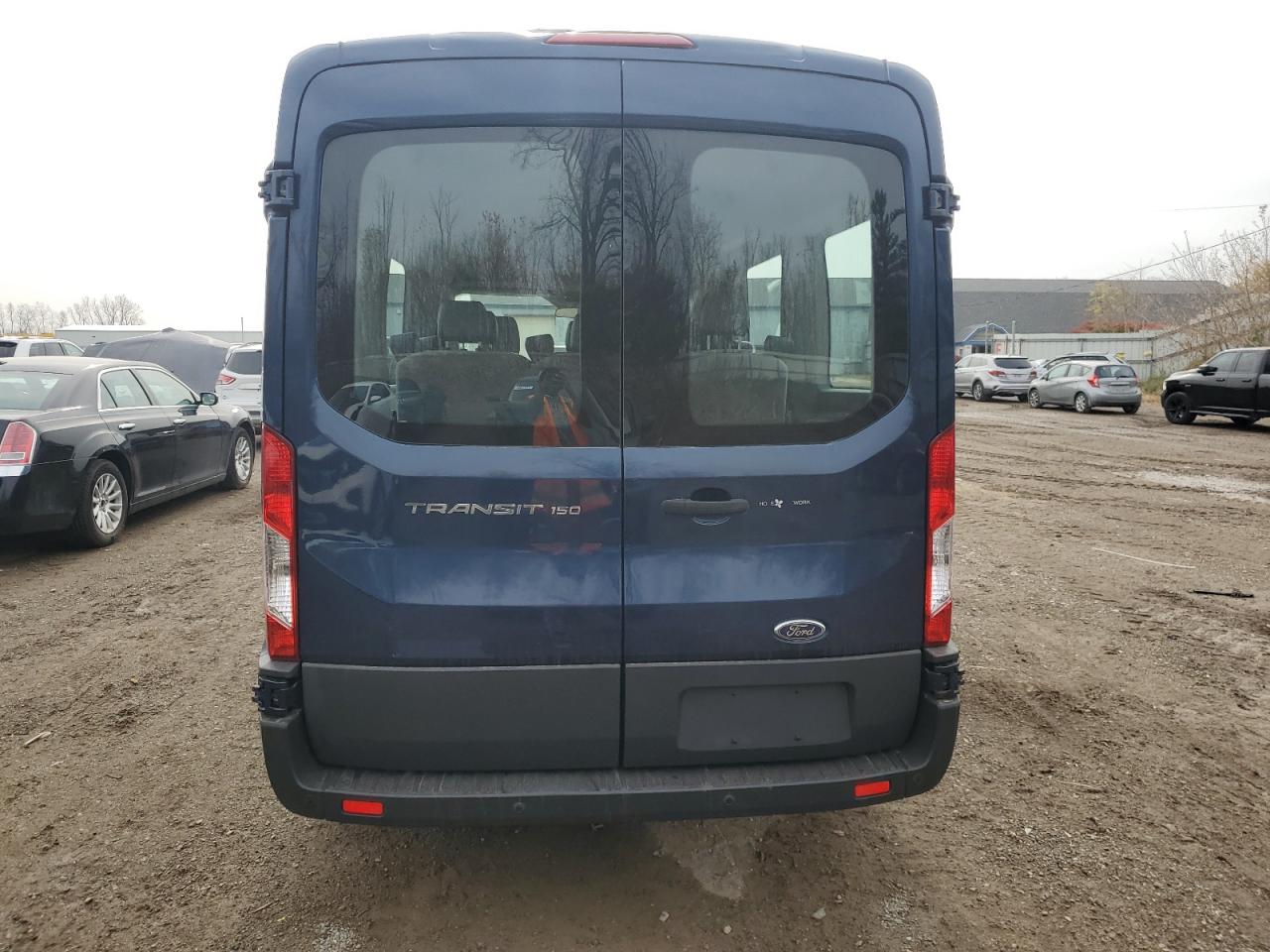 2015 Ford Transit T-150 VIN: 1FMZK1CM2FKB31879 Lot: 77944234