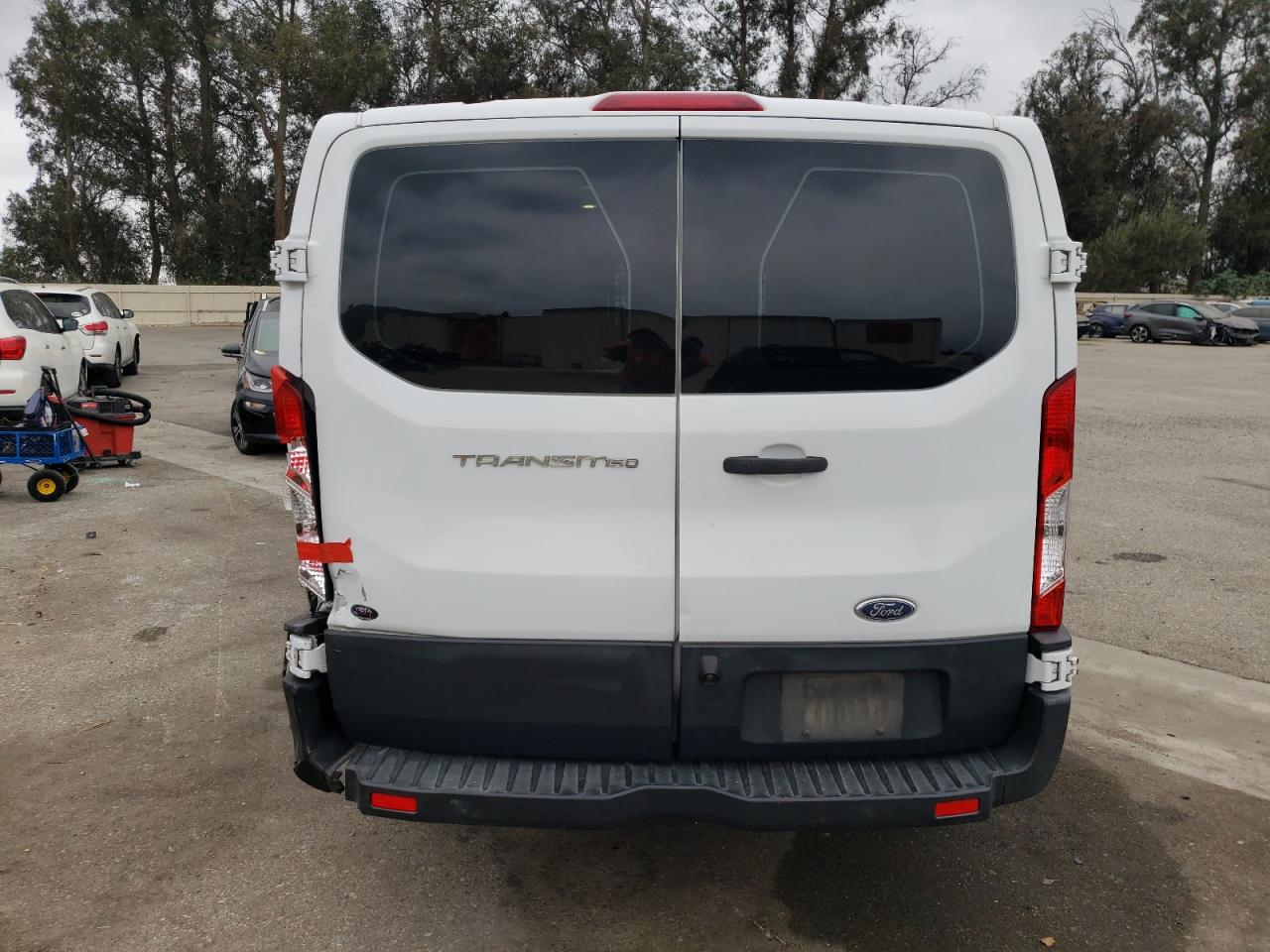 2017 Ford Transit T-150 VIN: 1FTYE1ZM2HKA56263 Lot: 76285854