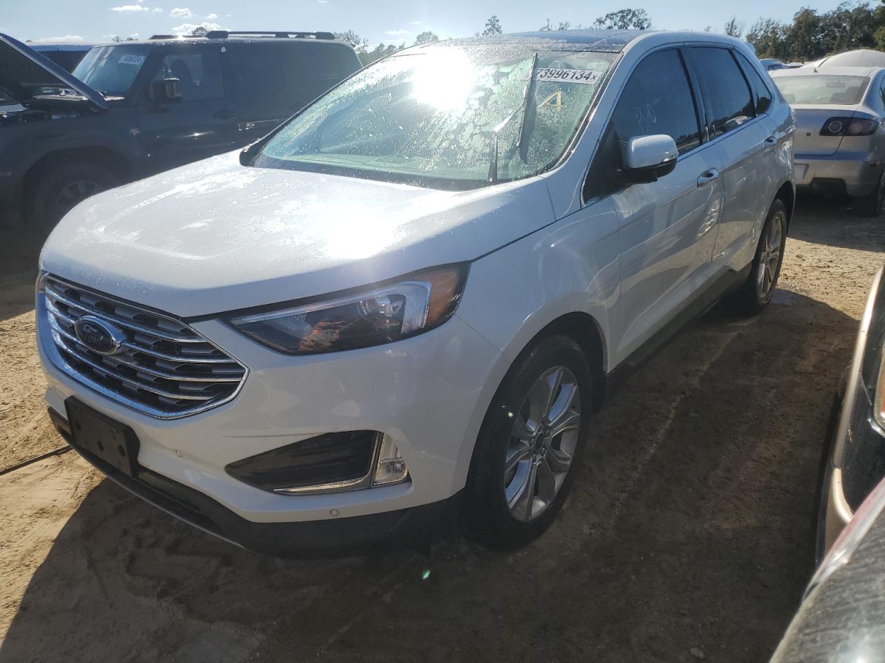 2022 Ford Edge Titanium VIN: 2FMPK4K94NBA71909 Lot: 73996134