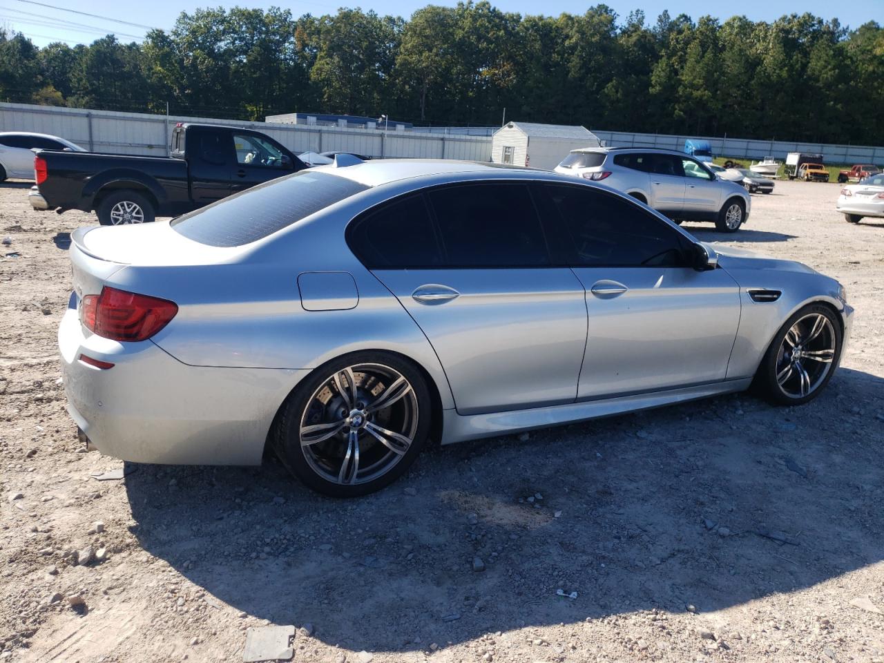 2013 BMW M5 VIN: WBSFV9C59DD097102 Lot: 74764574