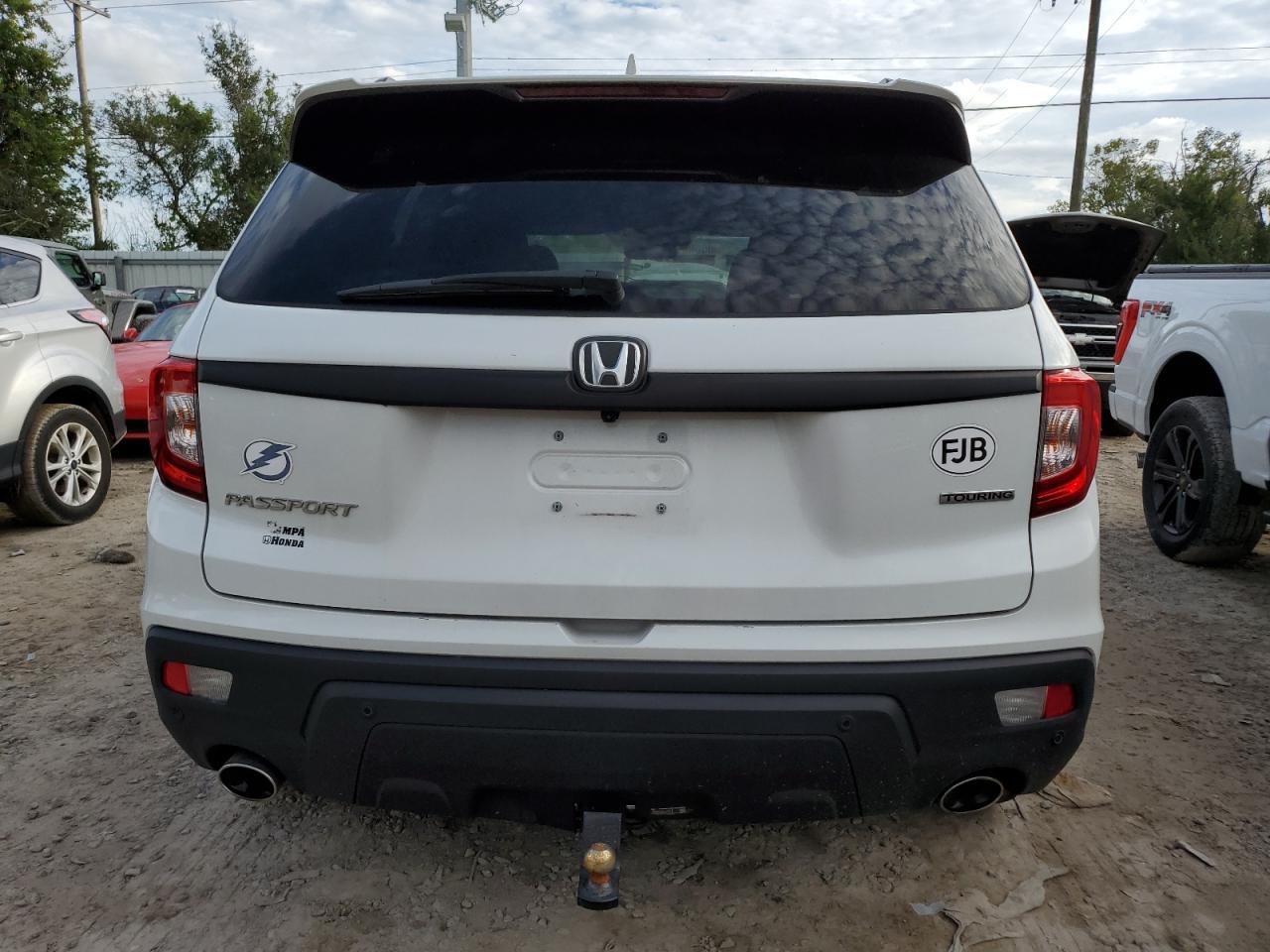 2021 Honda Passport Touring VIN: 5FNYF7H93MB014916 Lot: 75050454