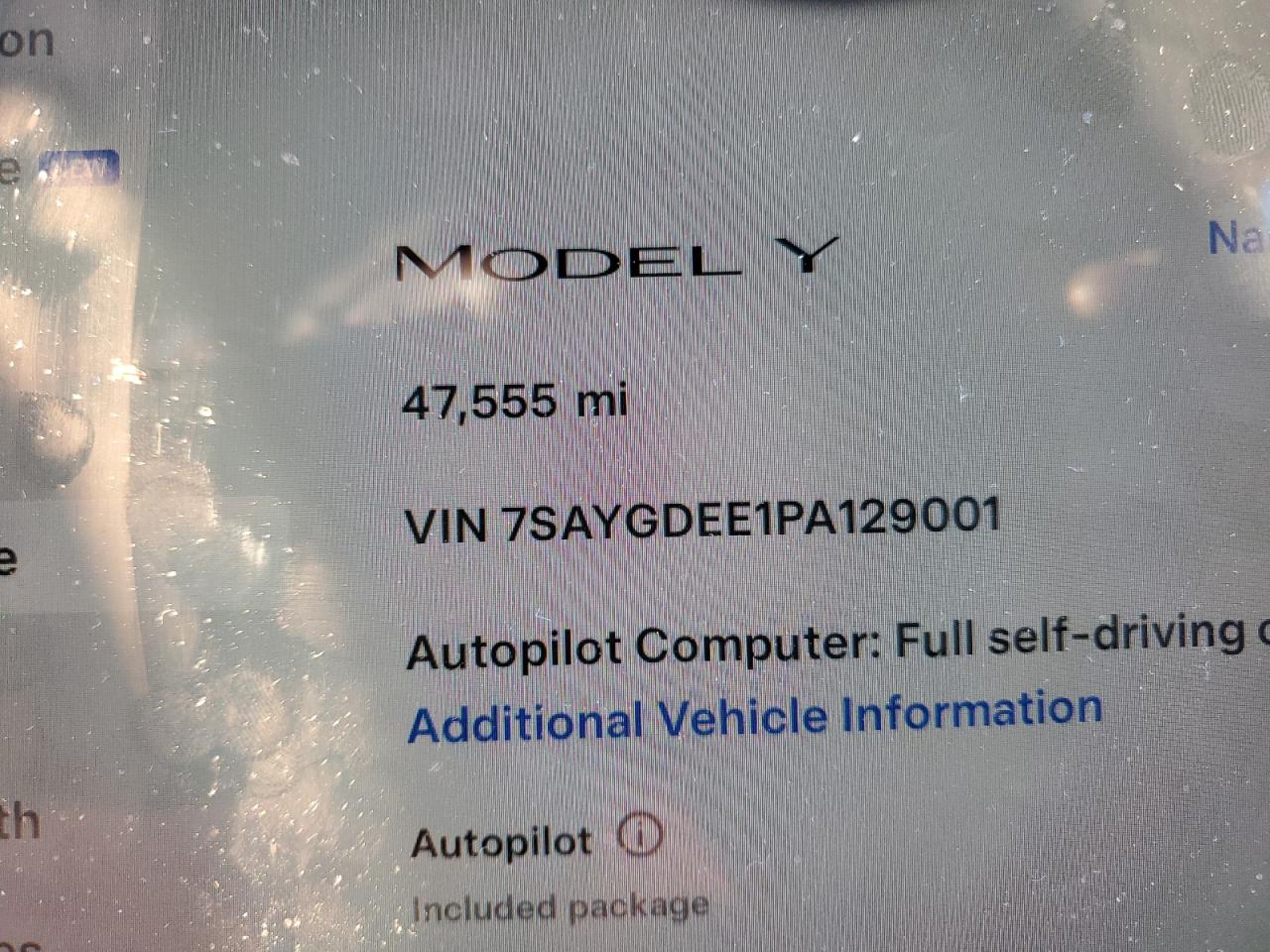 2023 Tesla Model Y VIN: 7SAYGDEE1PA129001 Lot: 74830714