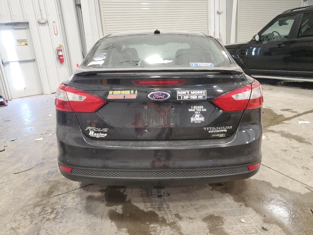 2014 Ford Focus Titanium VIN: 1FADP3J22EL192791 Lot: 73967974