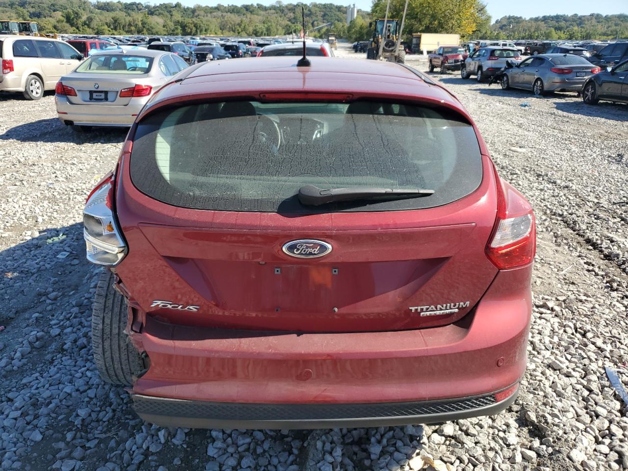 2014 Ford Focus Titanium VIN: 1FADP3N23EL338058 Lot: 74359204