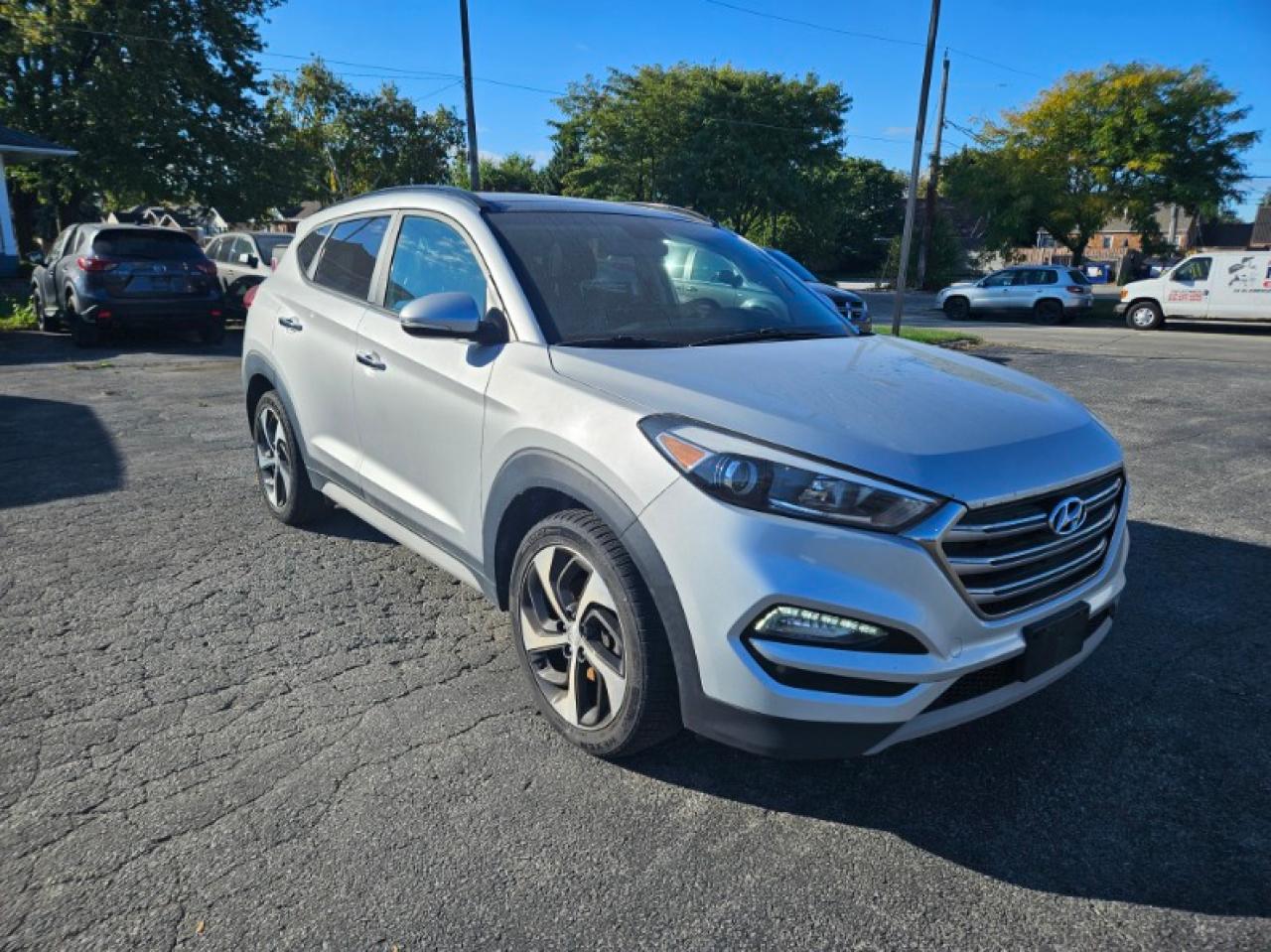 KM8J3CA25HU458873 2017 HYUNDAI TUCSON - Image 1