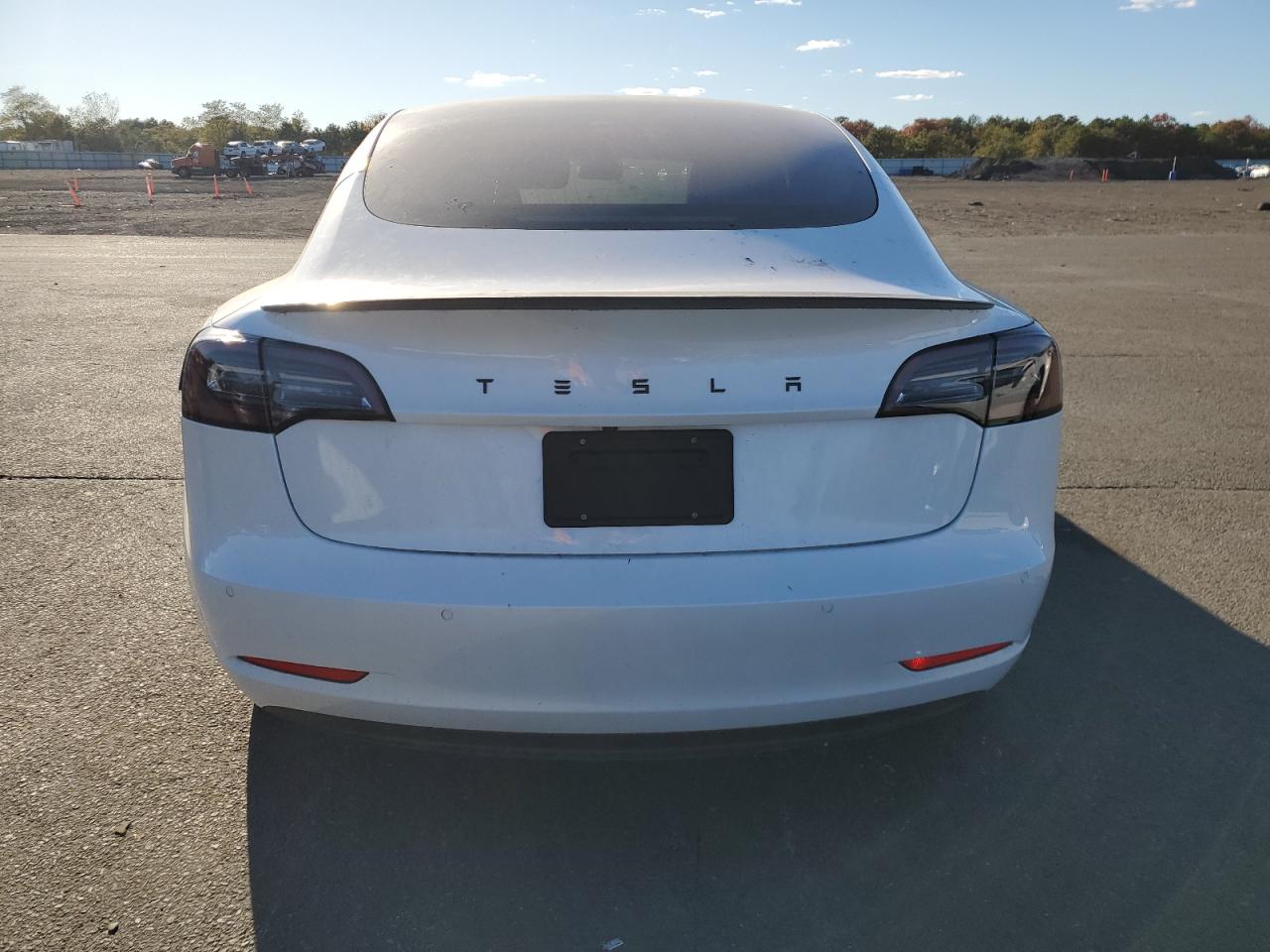 2019 Tesla Model 3 VIN: 5YJ3E1EB7KF413648 Lot: 76613404