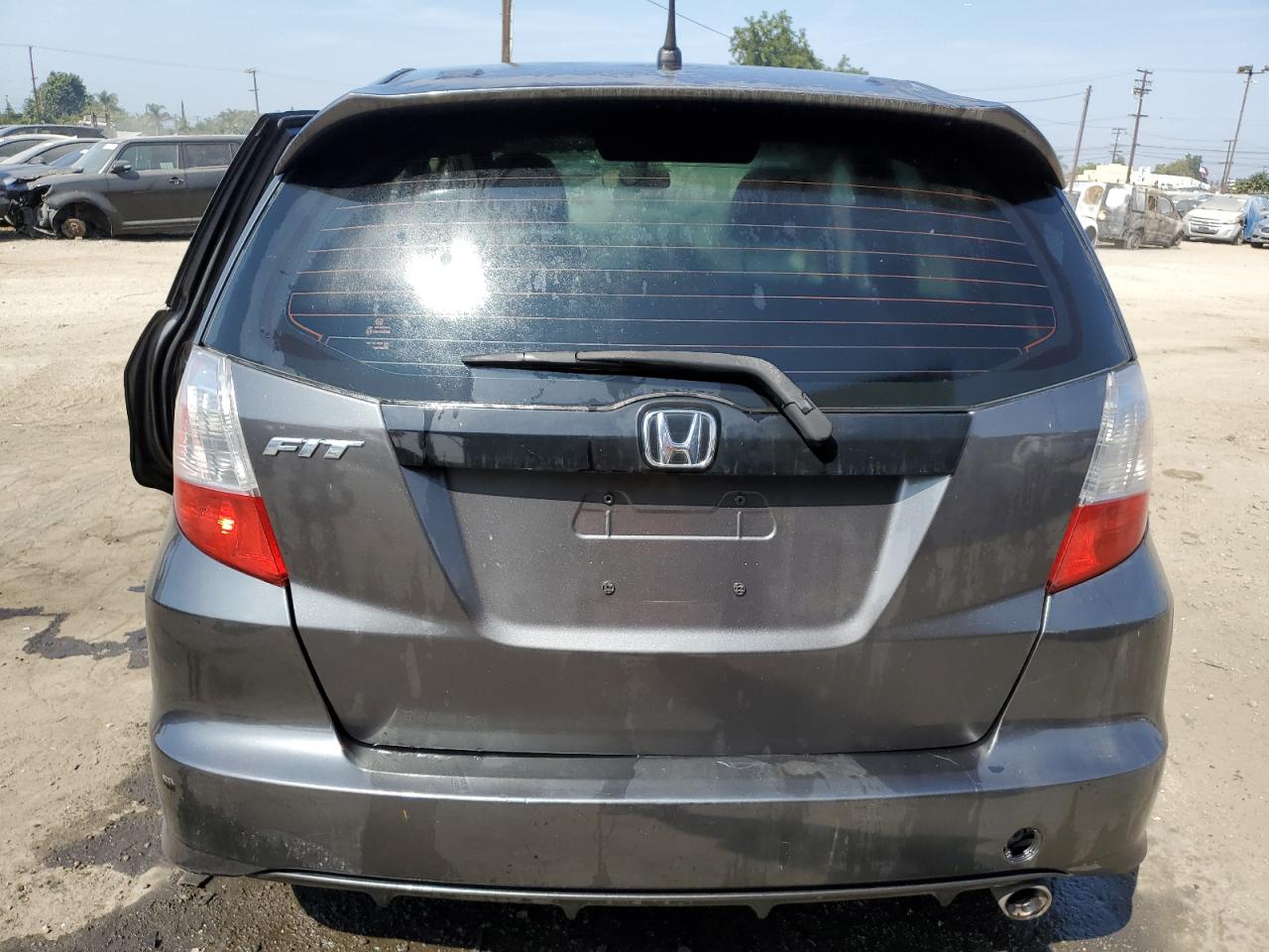 2012 Honda Fit Sport VIN: JHMGE8H5XCC028002 Lot: 74577234