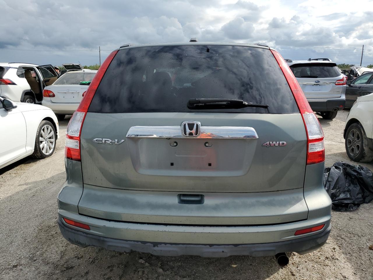 2010 Honda Cr-V Exl VIN: JHLRE4H73AC012356 Lot: 73823834