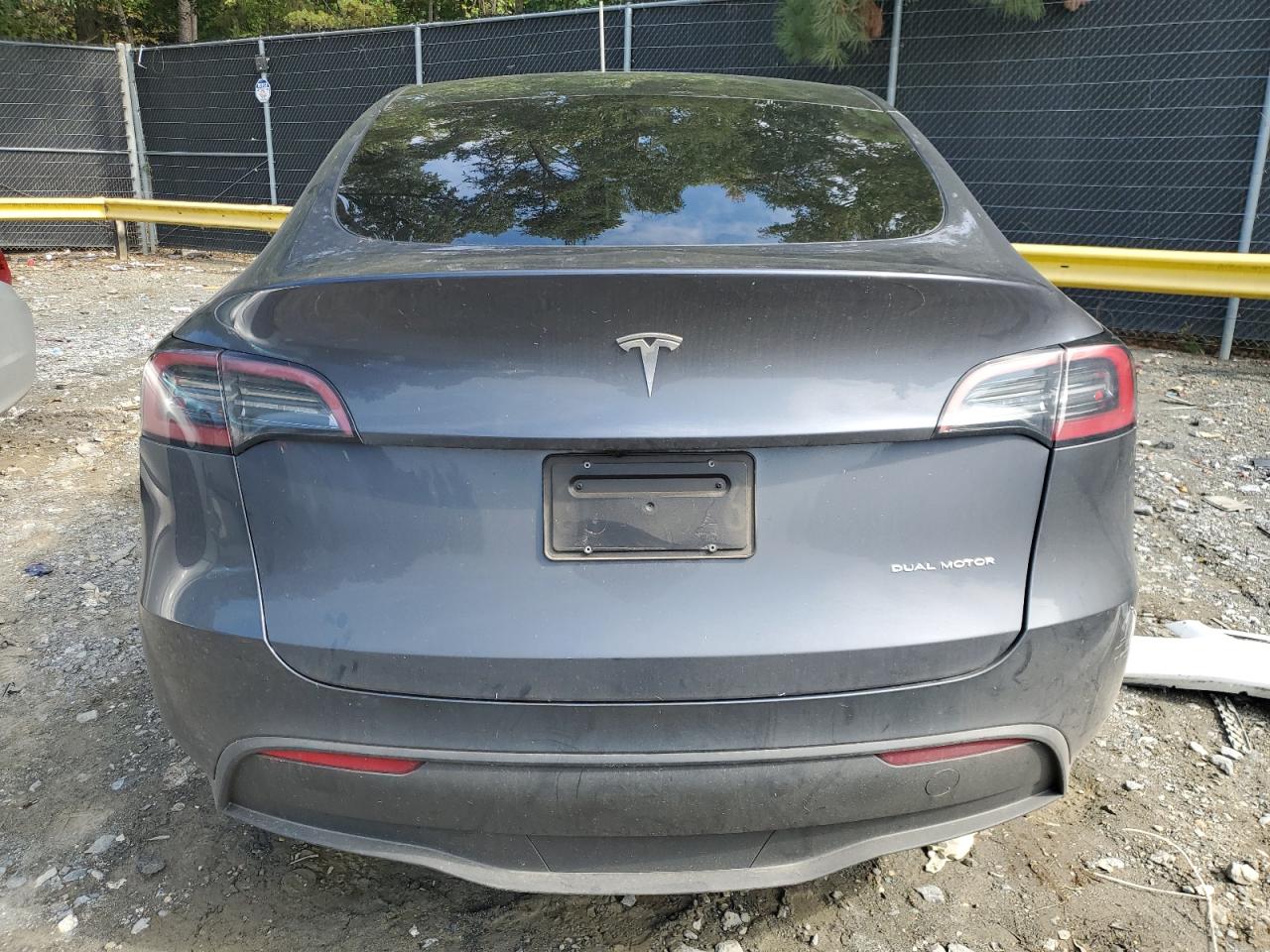 2023 Tesla Model Y VIN: 7SAYGDEE5PF857570 Lot: 74599374