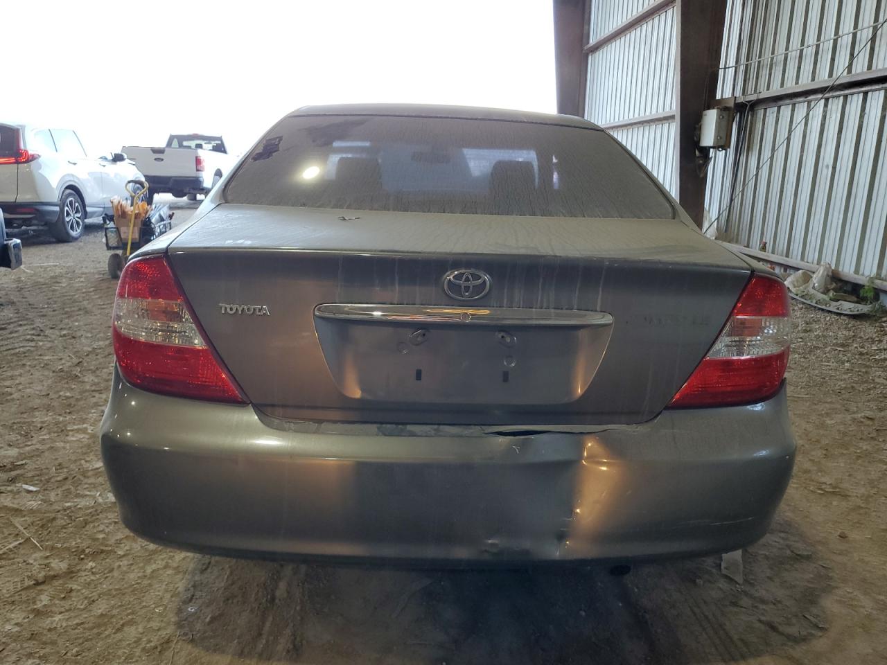 2002 Toyota Camry Le VIN: JTDBE32K420019521 Lot: 75960734