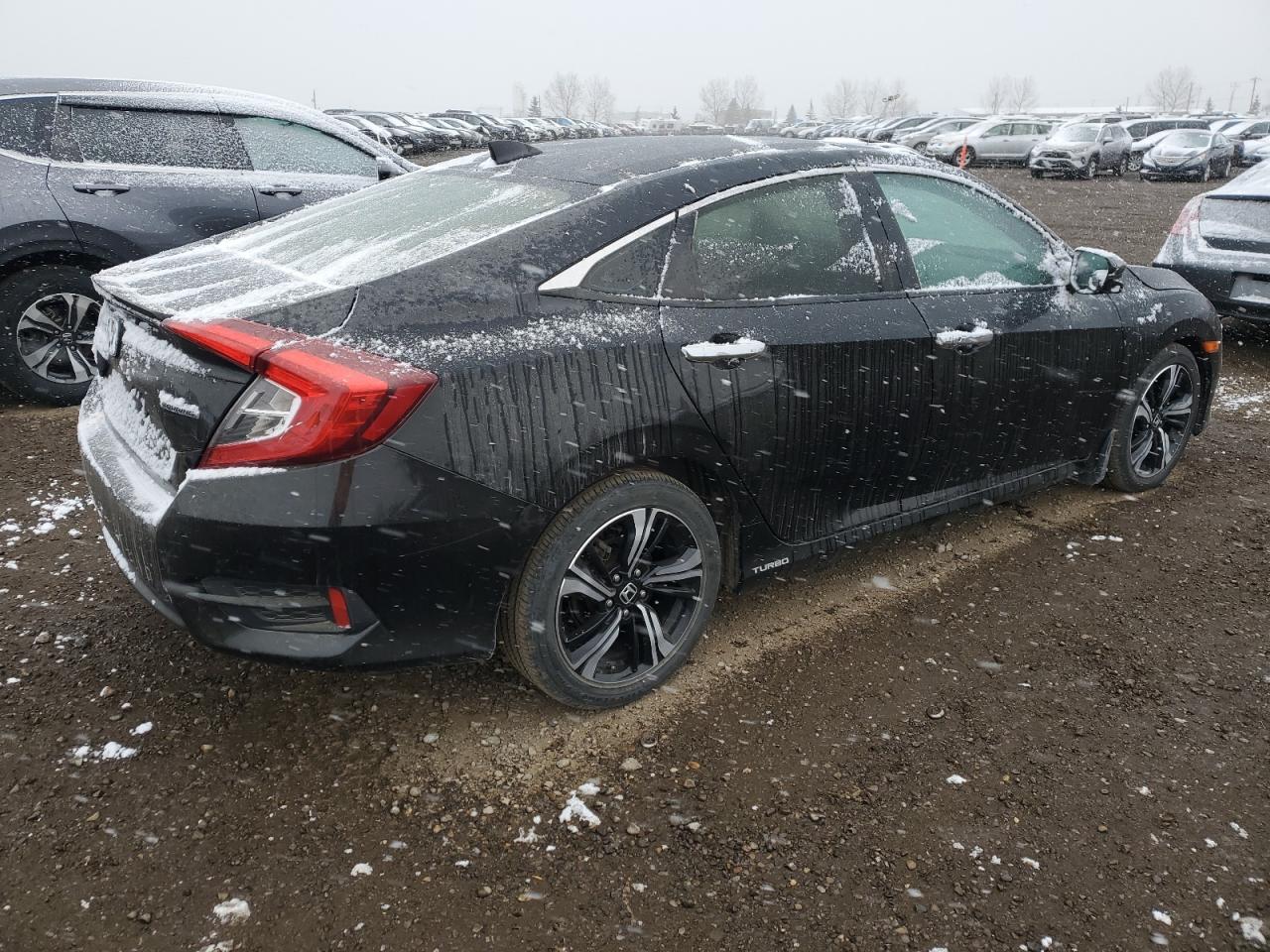 2017 Honda Civic Touring VIN: 2HGFC1F91HH103336 Lot: 74333494