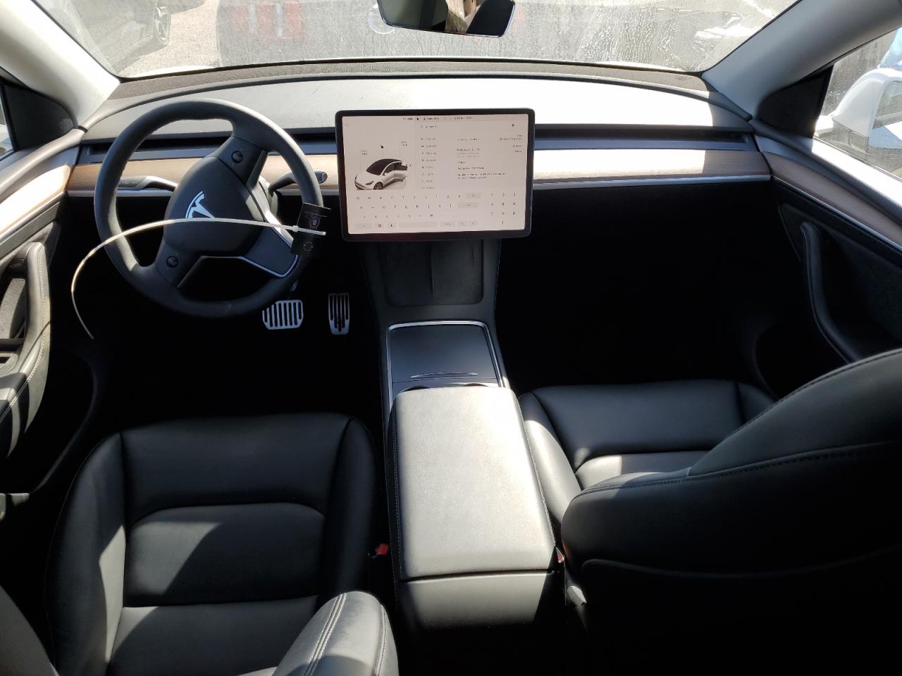 2023 Tesla Model Y VIN: 7SAYGAEE7PF877589 Lot: 87102585