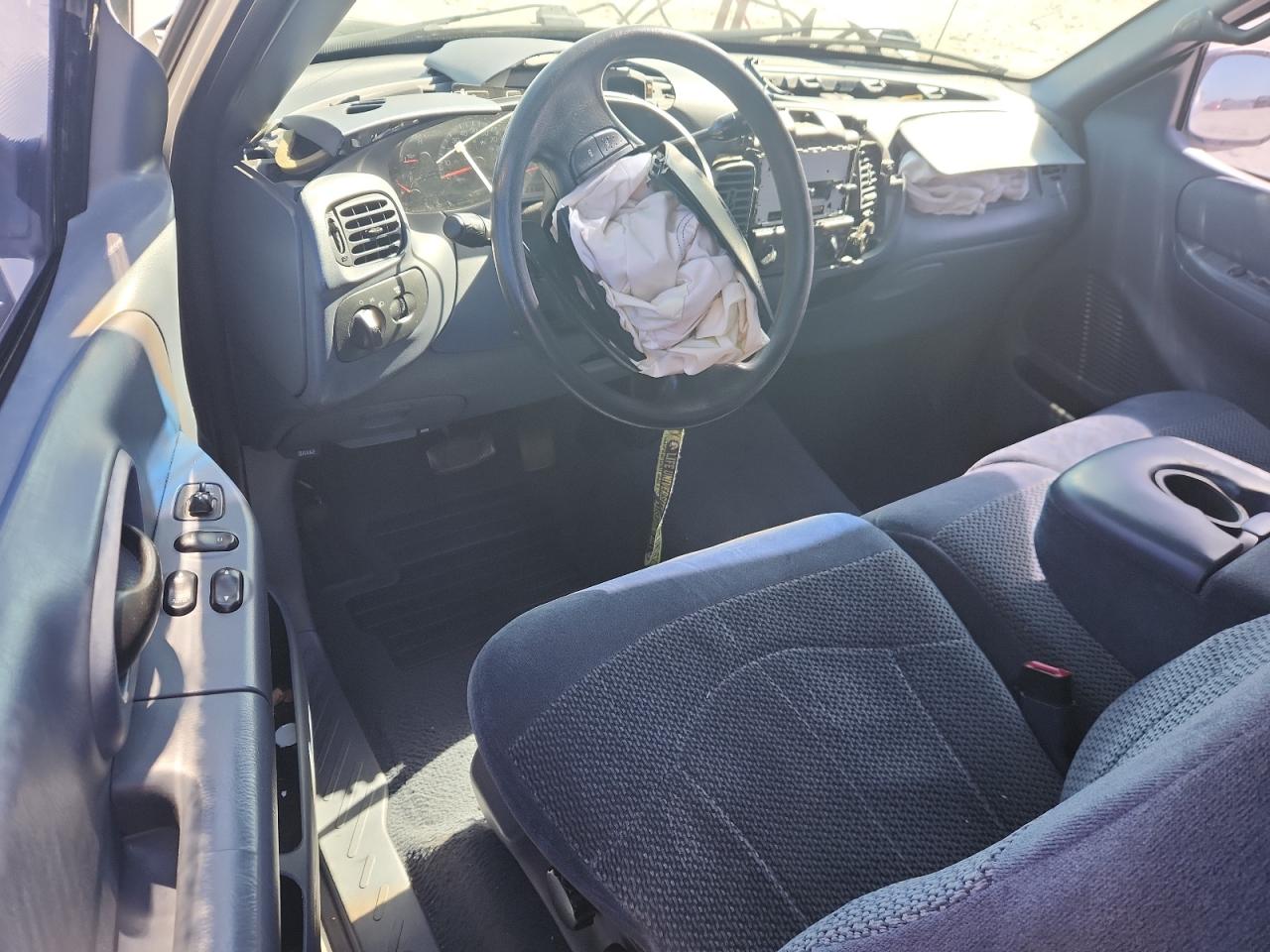 1999 Ford F150 VIN: 1FTZX1723XNA62201 Lot: 82415335